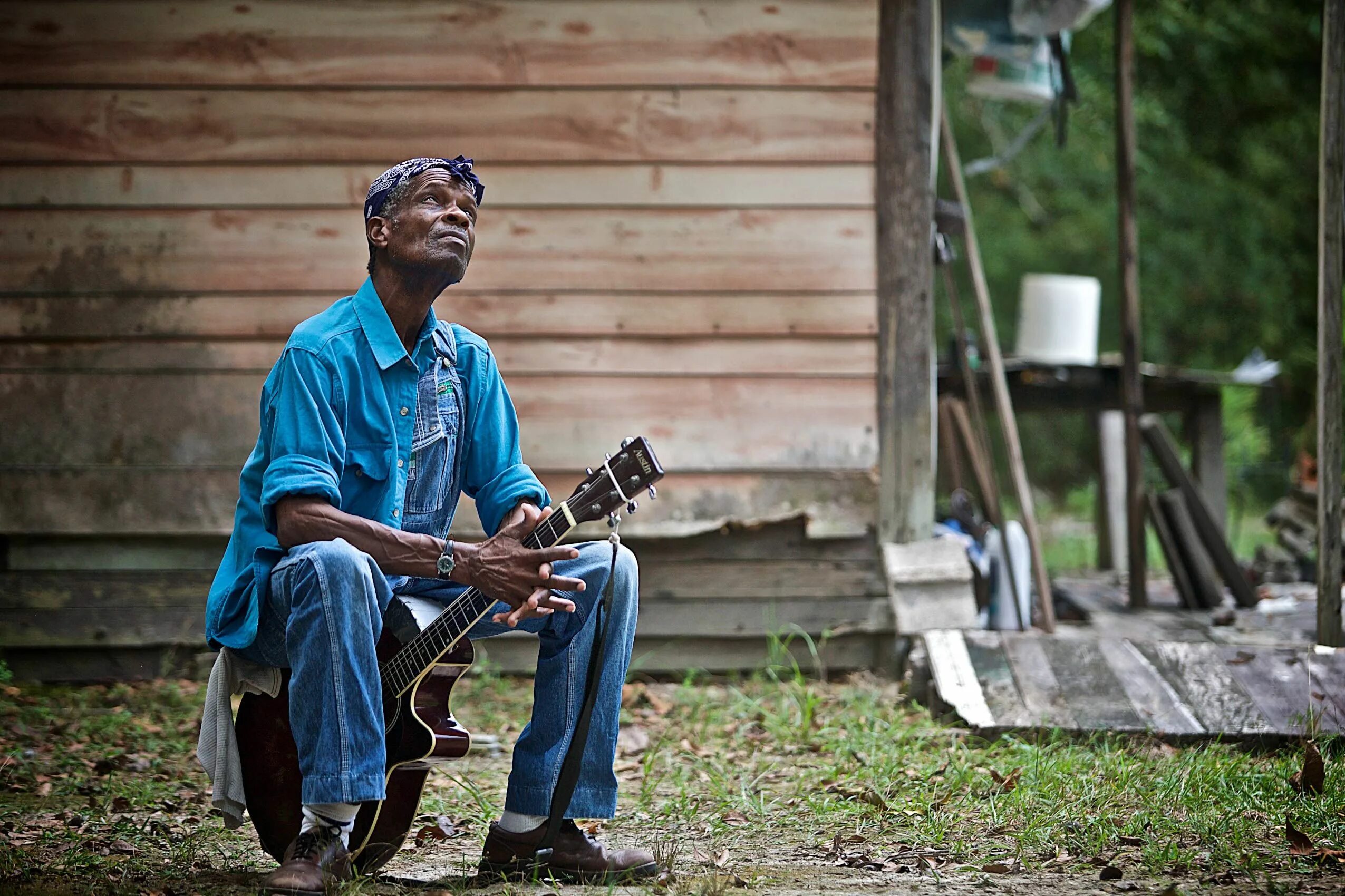 Lil jimmy reed. Блюз афроамериканцы. Афроамериканец гитарист хендрикс. Гитара американских негров. Спиричуэлс 19 век.