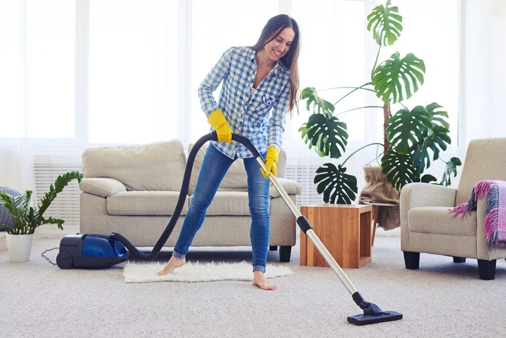 Home vacuum cleaner. Женщина пылесосит. Девушка пылесосит. Пылесос. Человек пылесосит.