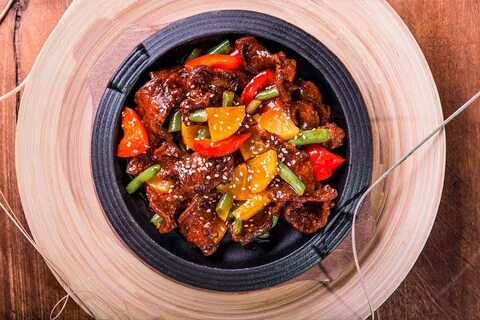 Говядина с овощами по тайски