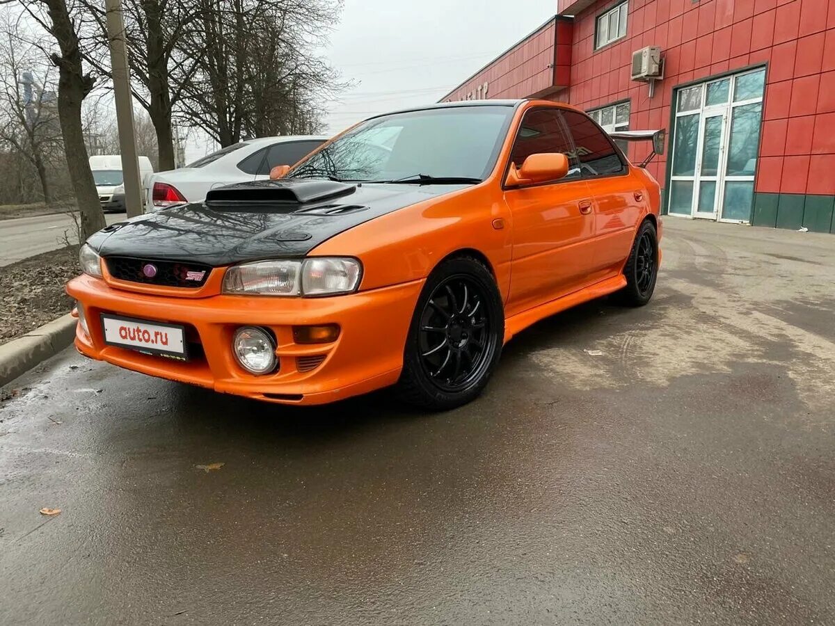 Субару импреза 2000 года. Subaru Impreza 2000. Субару Импреза WRX оранжевый. Subaru Impreza оранжевая. Subaru Impreza 2007 оранжевая.