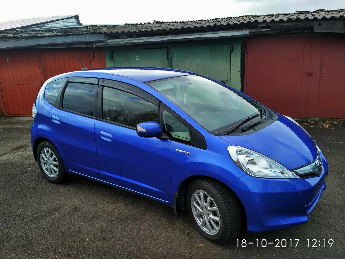 Honda Fit II Hybrid, 2013. Honda Fit левый руль. Хонда фит 2012 года. Хонда фит 2 2008 левый руль.