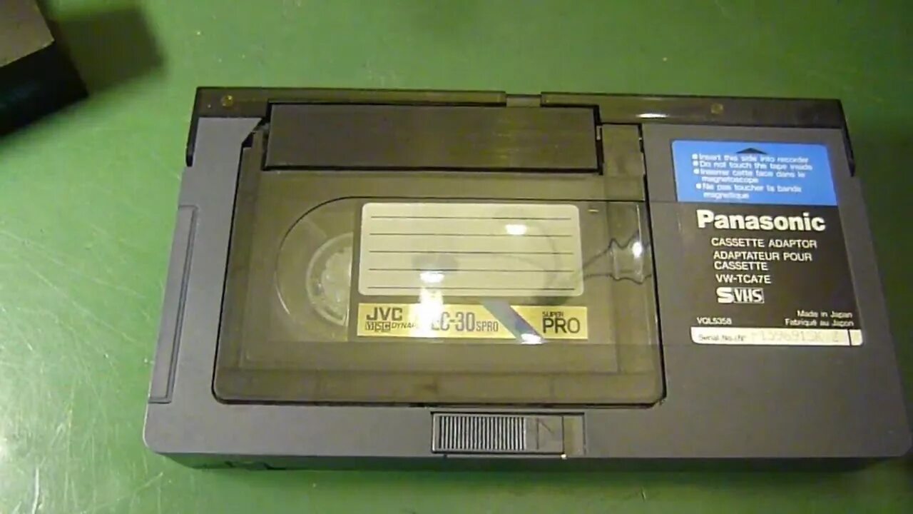 Кассета панасоник. Panasonic VHS-C кассета. Панасоник адаптер для видеокассет. Panasonic VW-tca7e VHS. Panasonic Panasonic VHS кассета адаптер VW-tca7e.