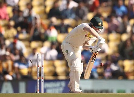 Australia is bowled by Mohammed Shami of India during day one of the First Test...