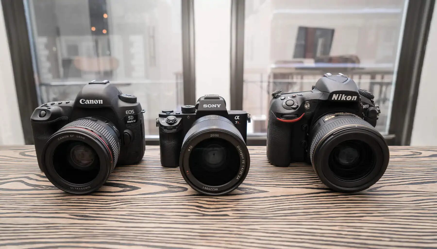 Sony canon сравнение. Canon Sony a7iii. Nikon EOS 5d. Canon r5 Sony a7 IV. Canon vs Nikon vs Sony.