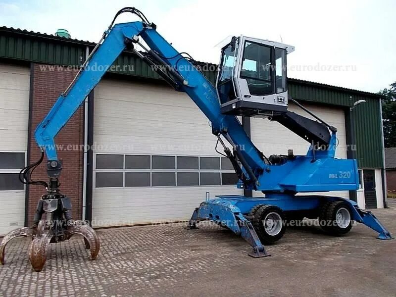 Перегружатели fuchs. Грейферный погрузчик terex fuchs mhl 320. погрузчик-перегружатель terex fuchs mhl 380d. terex fuchs mhl 320e реле. fuchs mhl 350.