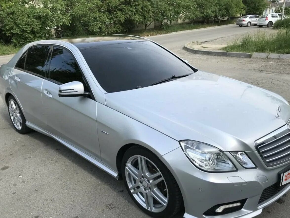 212 кузов купить. Мерседес е200 2011. Мерседес е212 серебристый. Mercedes e 212 серебристый. Мерседес е212 серая тонированная.