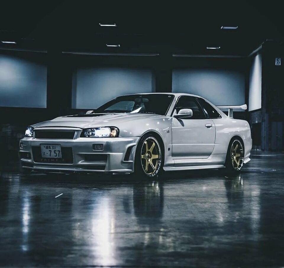 Скай лайн. Ниссан Скайлайн 34. Nissan Skyline GTR r34. Nissan Skyline r34 gt-r. Skyline r34 седан.