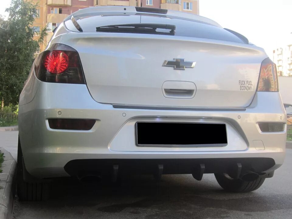 Диффузор заднего бампера шевроле круз. Chevrolet cruze hatchback диффузор. диффузор заднего бампера шевроле круз хэтчбек.