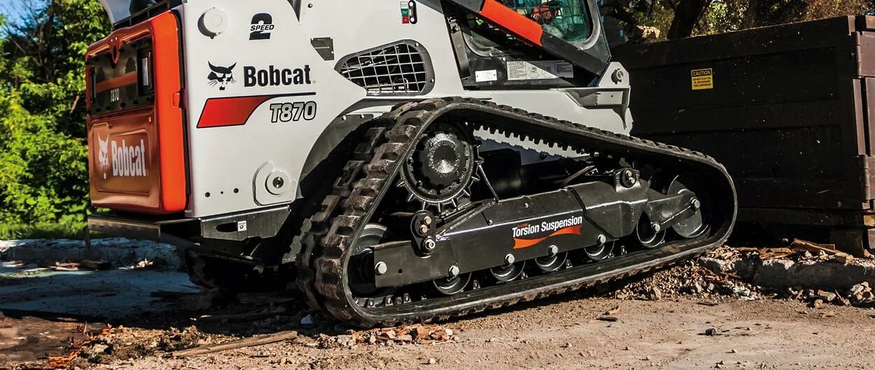 Bobcat гусеничный. Bobcat t870. Бобкэт т770. Погрузчик Bobcat t770. Bobcat 5533 гусеничный.