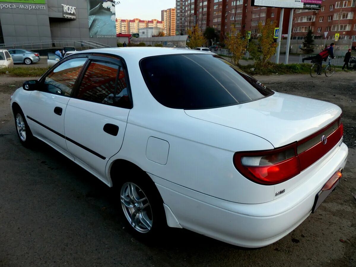 Яркие карину. Тойота Carina 1995. Toyota Carina t190.