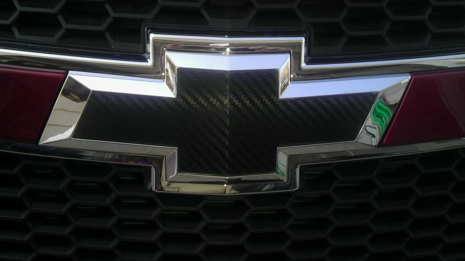 Машина знак крест. Logo Chevrolet 4x4. Chevrolet Corvette c4 значок. Chevrolet 955 logo. Марка автомобиля крестик.