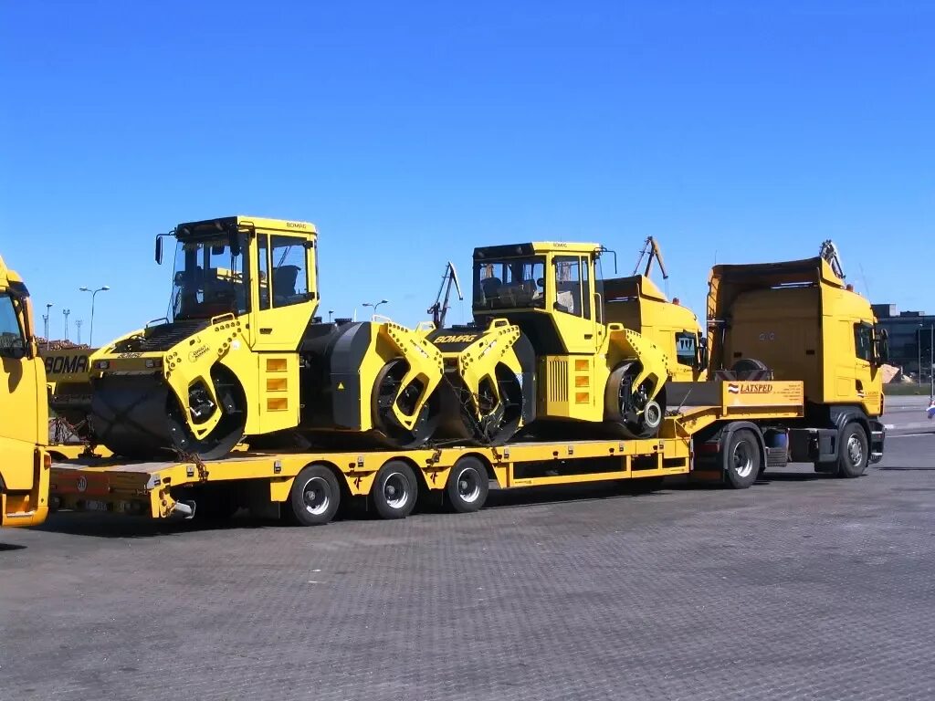 Строительная техника Бомаг дорожно. Спецтехника Bomag. Бомаг фронтальный погрузчик. Дорожностроительная техника.