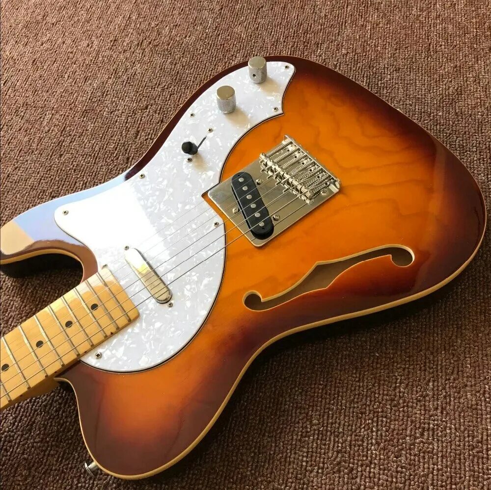 Электрогитара telecaster. Полуакустическая гитара телекастер. Полуакустическая гитара Telecaster. Полуакустический бас Fender. Телекастер электрогитара с хамбакерами.