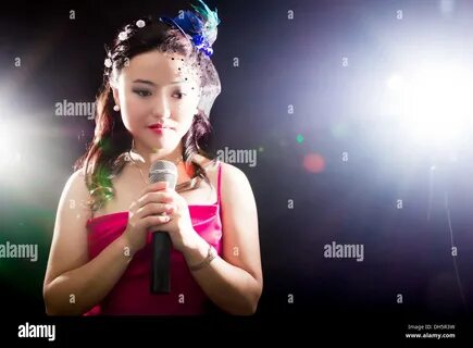 Concert young Asian singer of the girl Stock Photo.