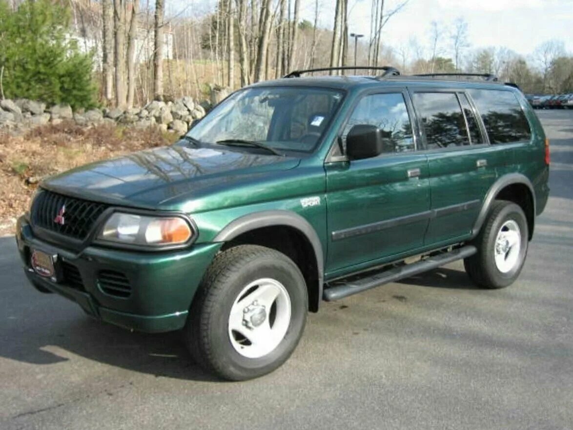 Montero sport 2000. Mitsubishi pajero sport 2000. Mitsubishi montero sport 2000 3. монтеро спорт 2000. митсубиси монтеро спорт 2000.