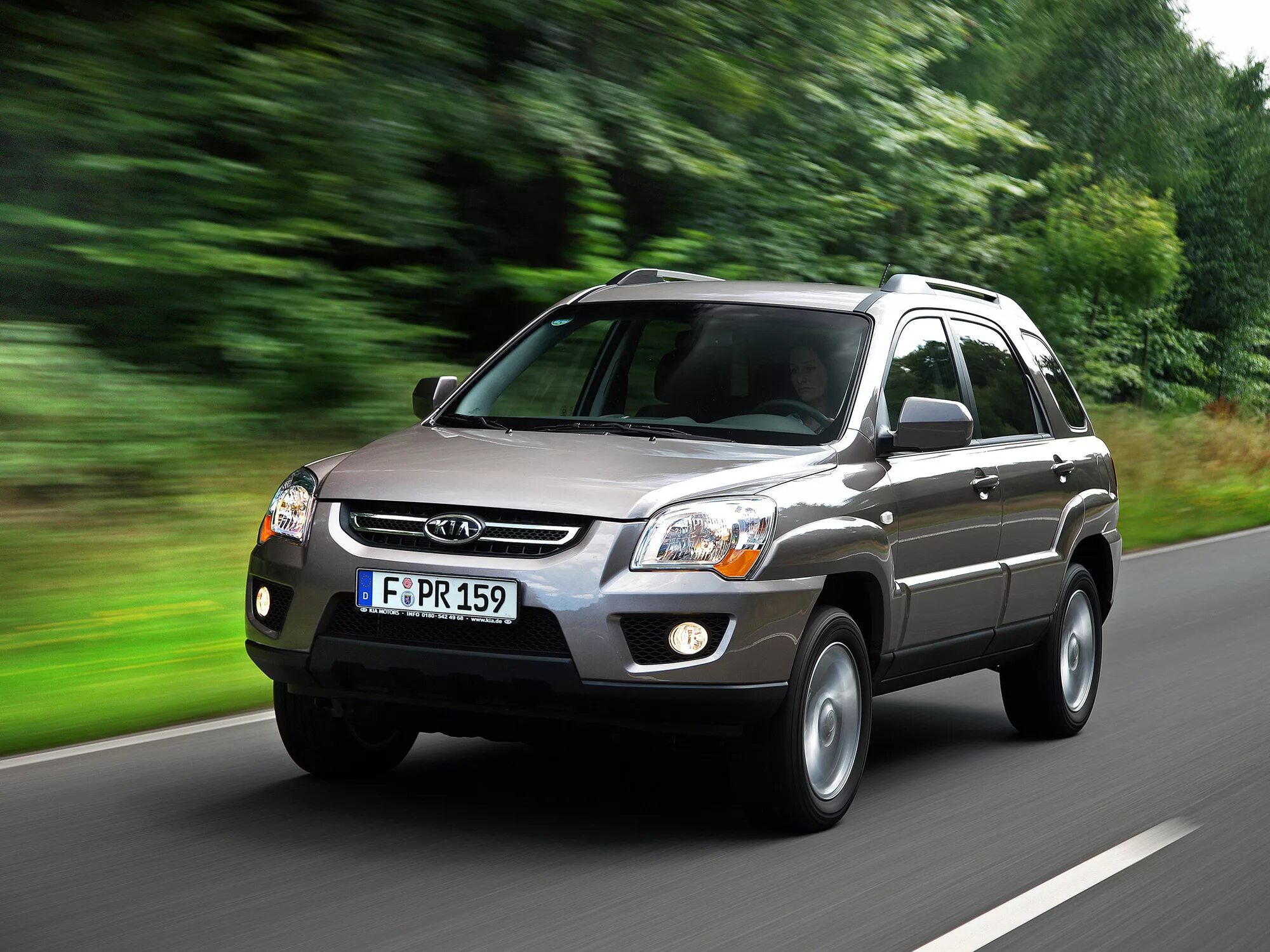 киа спортаж 2 поколения. Kia sportage 2004-2010. автомобиль киа спортейдж 2009 года. Kia sportage ii 2008. киа спортейдж 2 рестайлинговая v6.