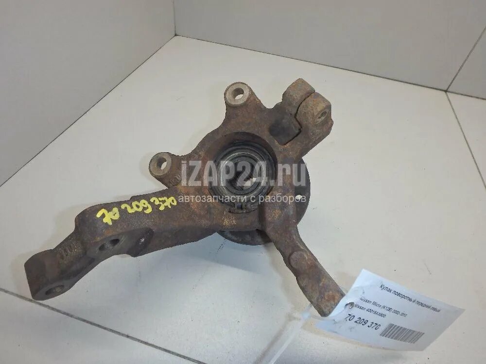 Nissan Note кулак поворотный 40014ax600. Поворотный кулак Nissan Note e11. Ниссан ноут 1.4 цапфа. Поворотный кулак Ниссан ноут 1.6 левый.