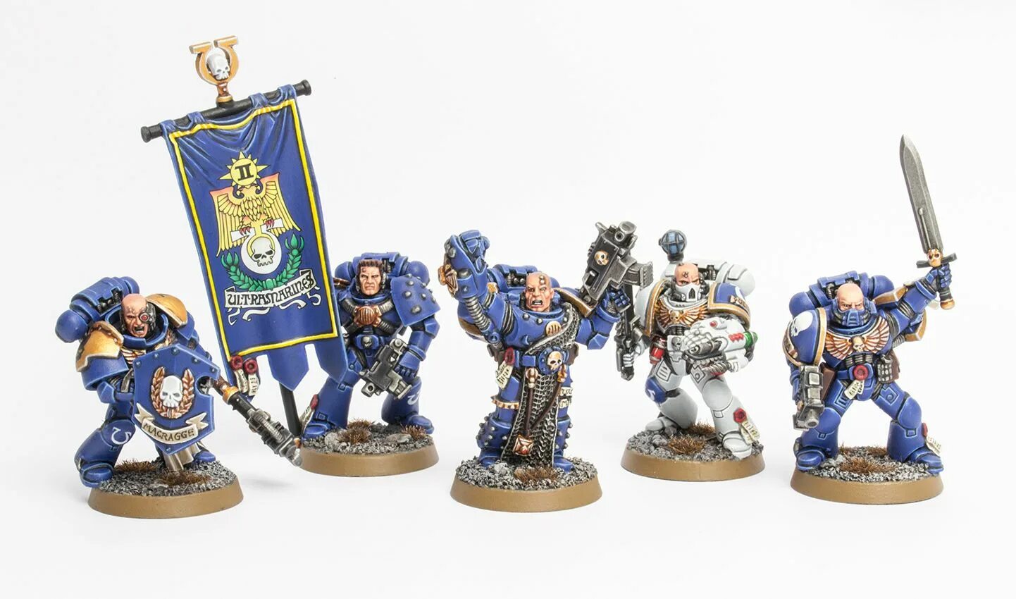 Warhammer 40000 Ultramarines Miniatures. Ордена Наследники Ультрамаринов вархаммер 40000. Вархаммер Ультрамарины миниатюры. Вархаммер 40000 командный отряд Ультрамаринов миниатюры.