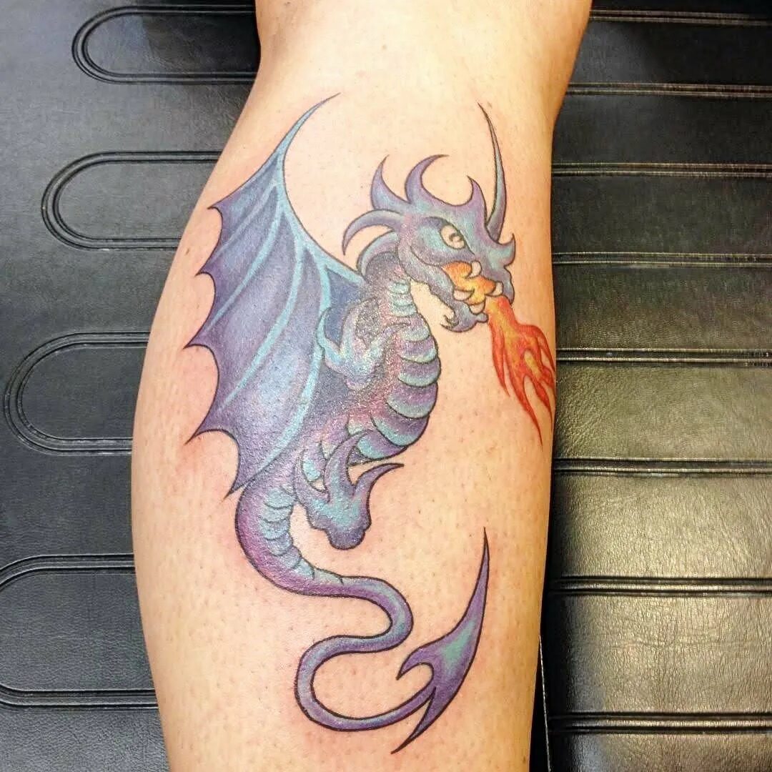 татуировка дракон на лопатке мужские. тата дракон. татуировки драконов. тата дракон. тату дракон на руке.