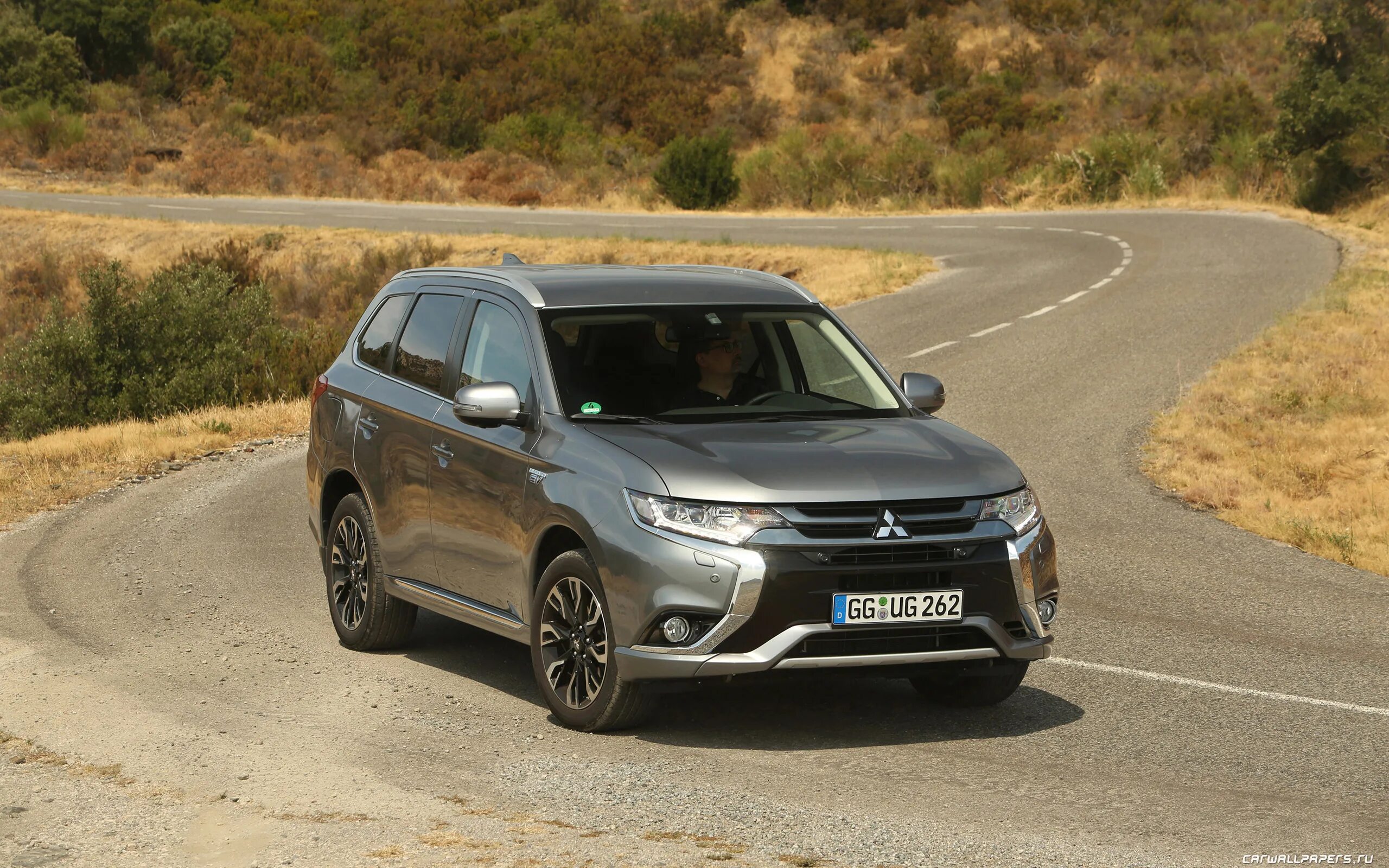 Mitsubishi outlander двухлитровый. Митсубиси Аутлендер PHEV 2015. Мицубиси Аутлендер 3. Outlander 2015. Мицубиси Аутлендер 4 2015.