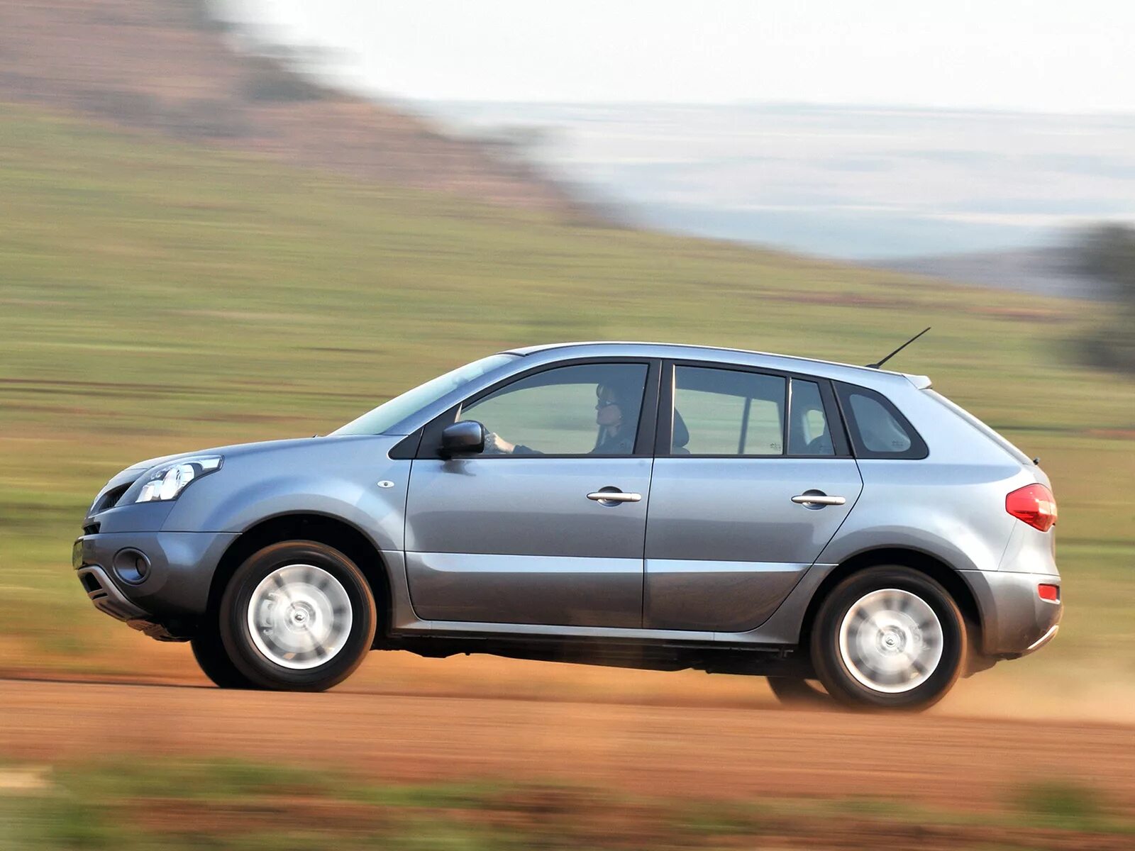 Рено колеос поколения. Renault KOLEOS 2008. Рено KOLEOS 2008. Рено Колеос 2008 года. Колеус РКНО 2008.