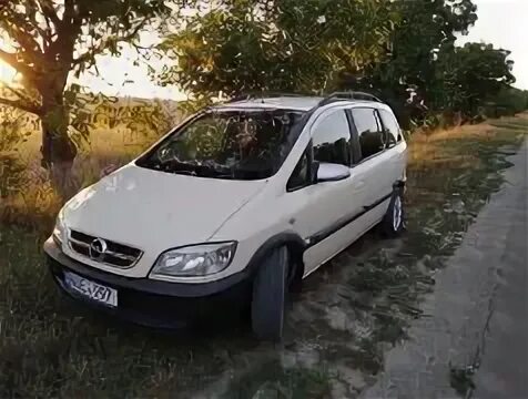 Opel zafira 2004. Опель Зафира 2004. Опель Зафира белая 2004. Опель Зафира 2004г.