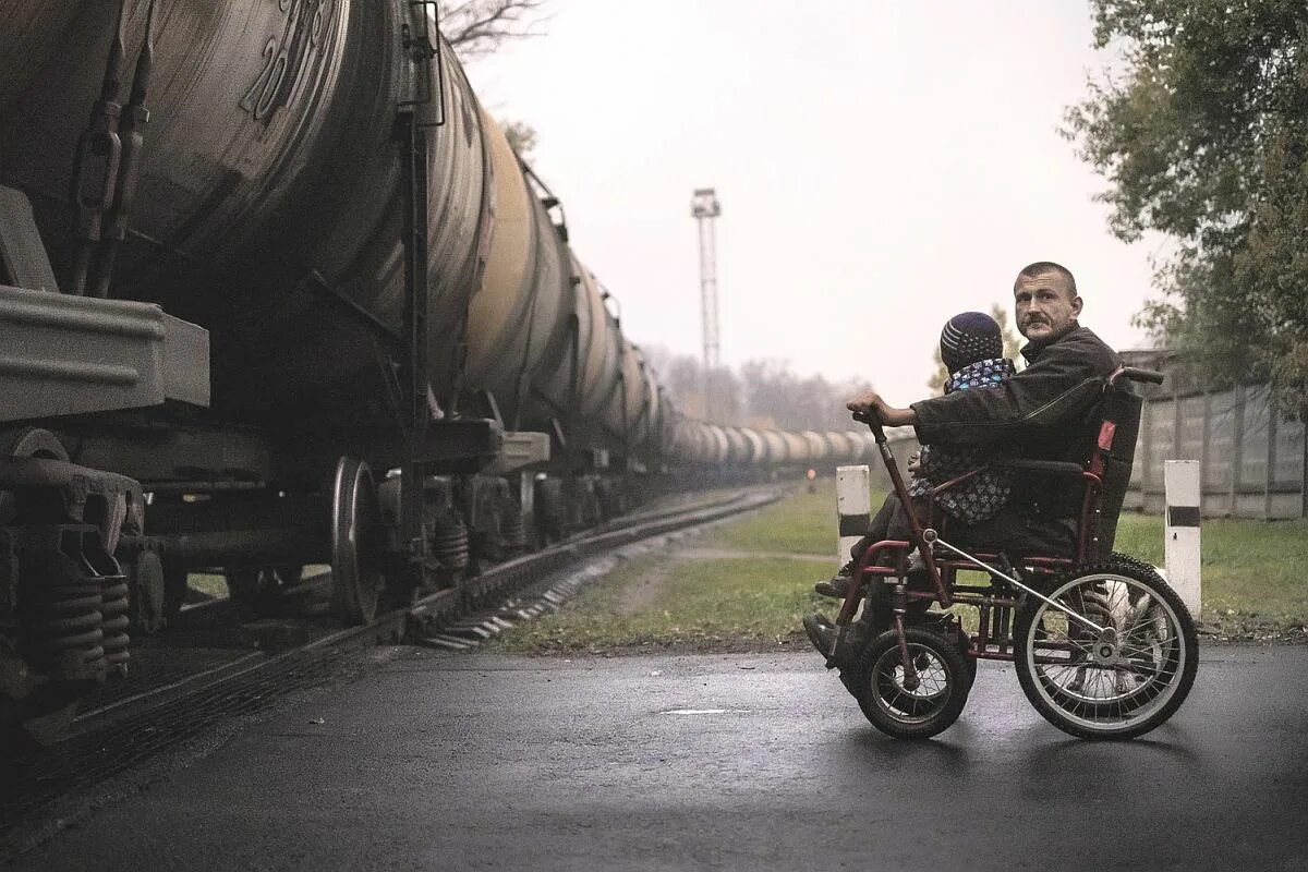 Отец и сын инвалид. Папа инвалид. фотограф инвалид.