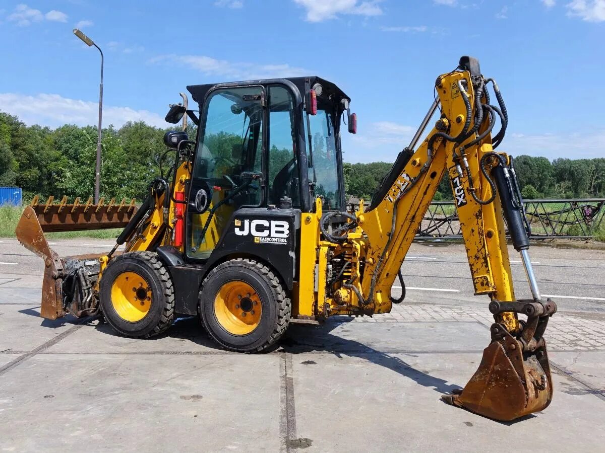 JCB 1cx. Мини погрузчик JCB 1cx. JCB 1cx кабина. JSB экскаватор 1cx. Недорогой экскаватор погрузчик