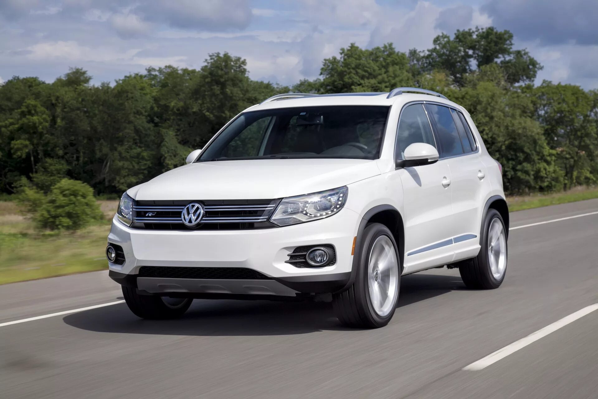 Фольц цена. Фольксваген Тигуан 2014. Tiguan Volkswagen Tiguan. Volkswagen Tiguan Фольксваген Тигуан. Кроссовер Фольксваген Тигуан.