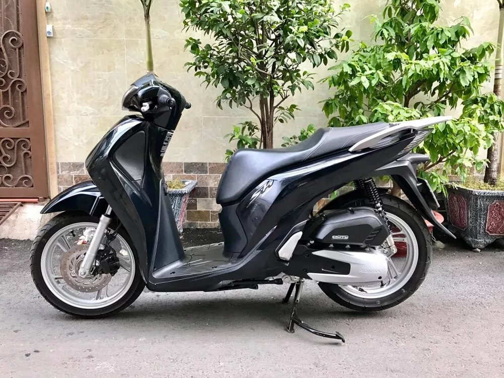 Хонда сх. Honda sh 150. Honda sh150 2005. Honda sh 300. Мопед Honda sh 150 кубовый.