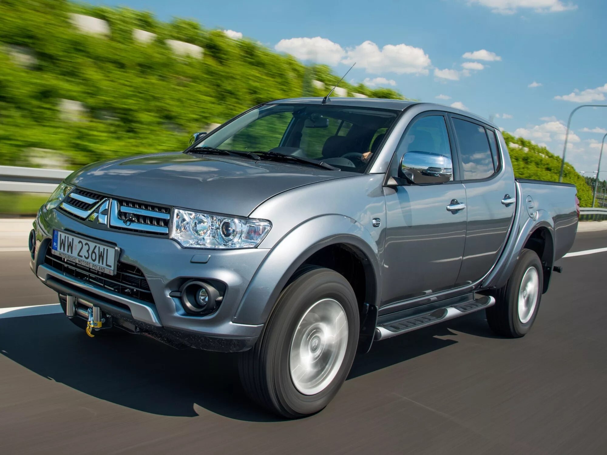 Мицубиси 2014г. Mitsubishi l200 IV. Mitsubishi Pickup l200. Митсубиси l200 DHD. Mitsubishi l200 IV поколение.