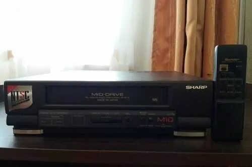 Шарп м. Видеомагнитофон шарп 1990. видеоплеер шарп vc m10. видеоплеер sharp vc -v50. кассетный видеомагнитофон sharp vc-674.
