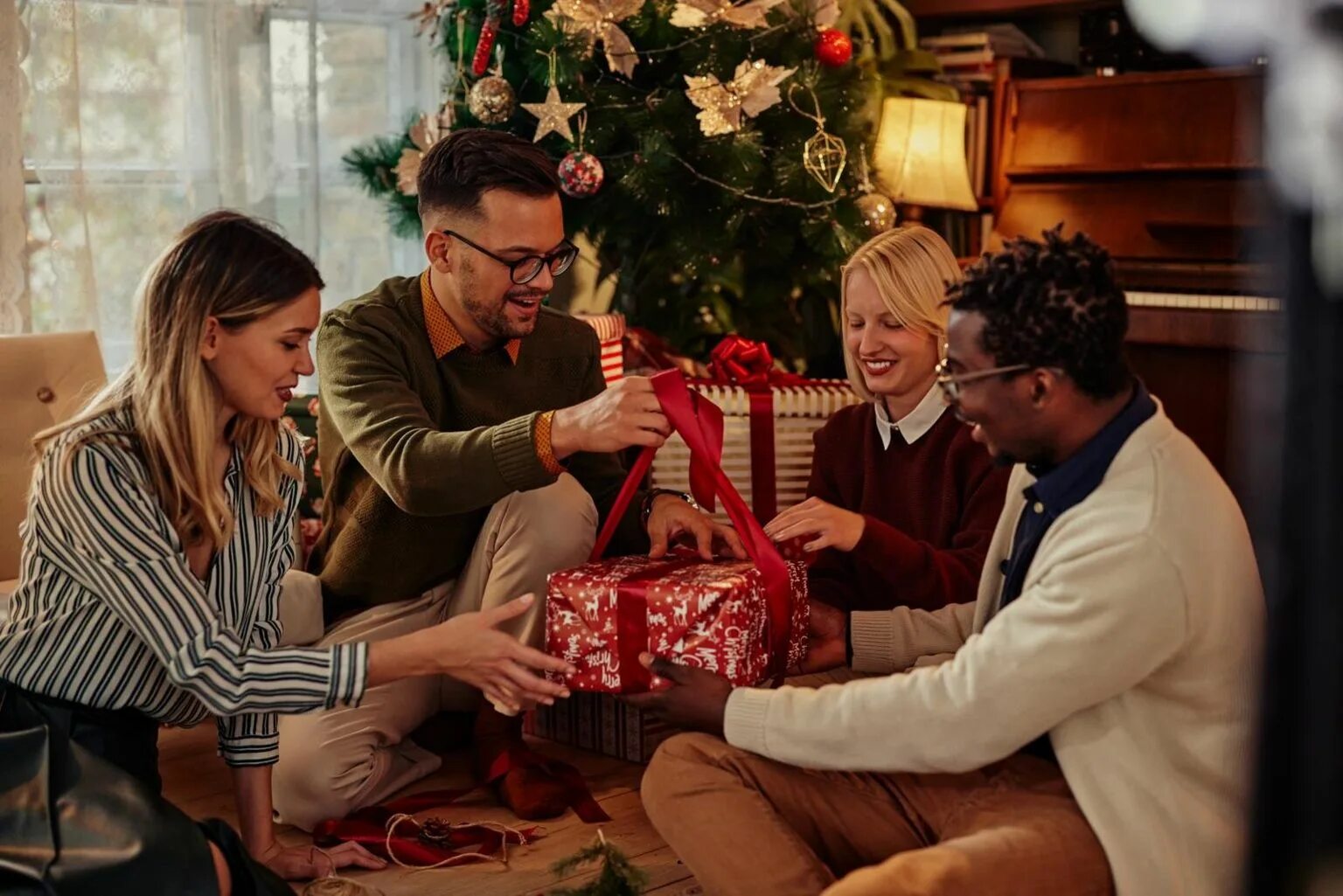 Opening presents on christmas. Christmas american family. Gifts from girlfriends. We give presents to our friends christmas. We give presents to our friends christmas.