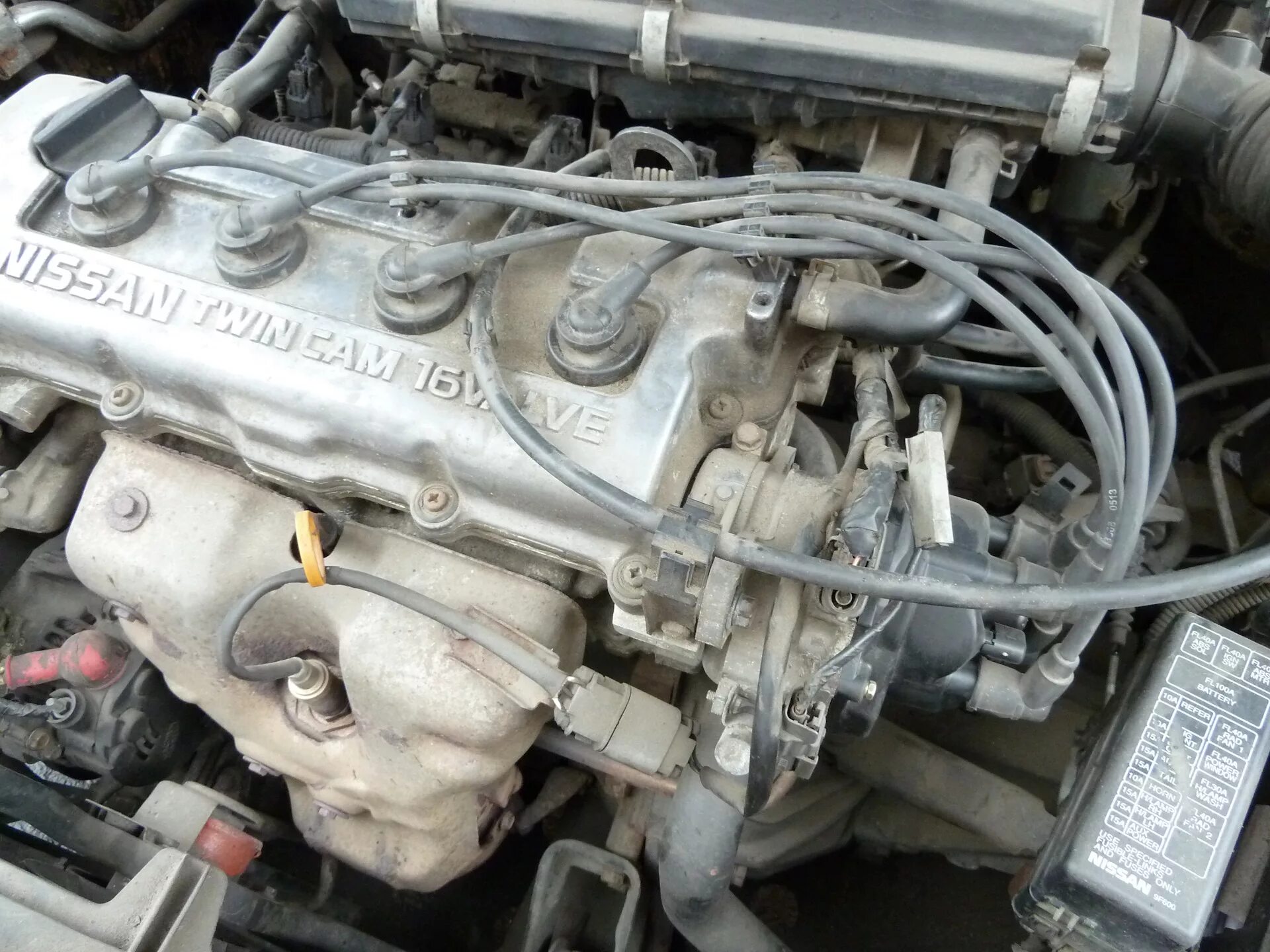Зажигания ниссан примера 1.6. Nissan almera n15 ga16de. двигатель nissan sunny 1.6л. ниссан санни 1996 двигатель. ниссан 2.0 двигатель зажигания.
