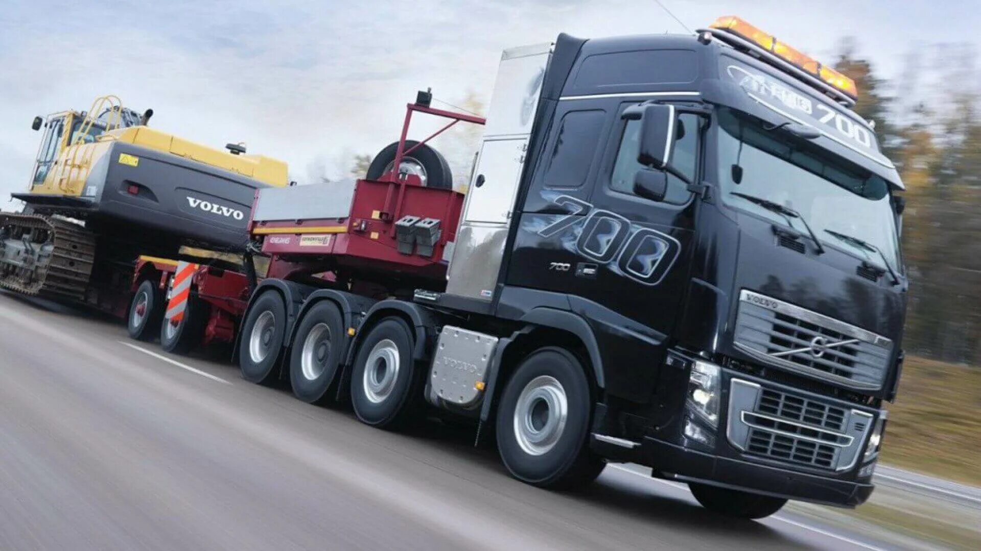 Volvo fh16 с тралом. Вольво с тралом негабарит. Volvo fh16 негабарит. Volvo FH 700.