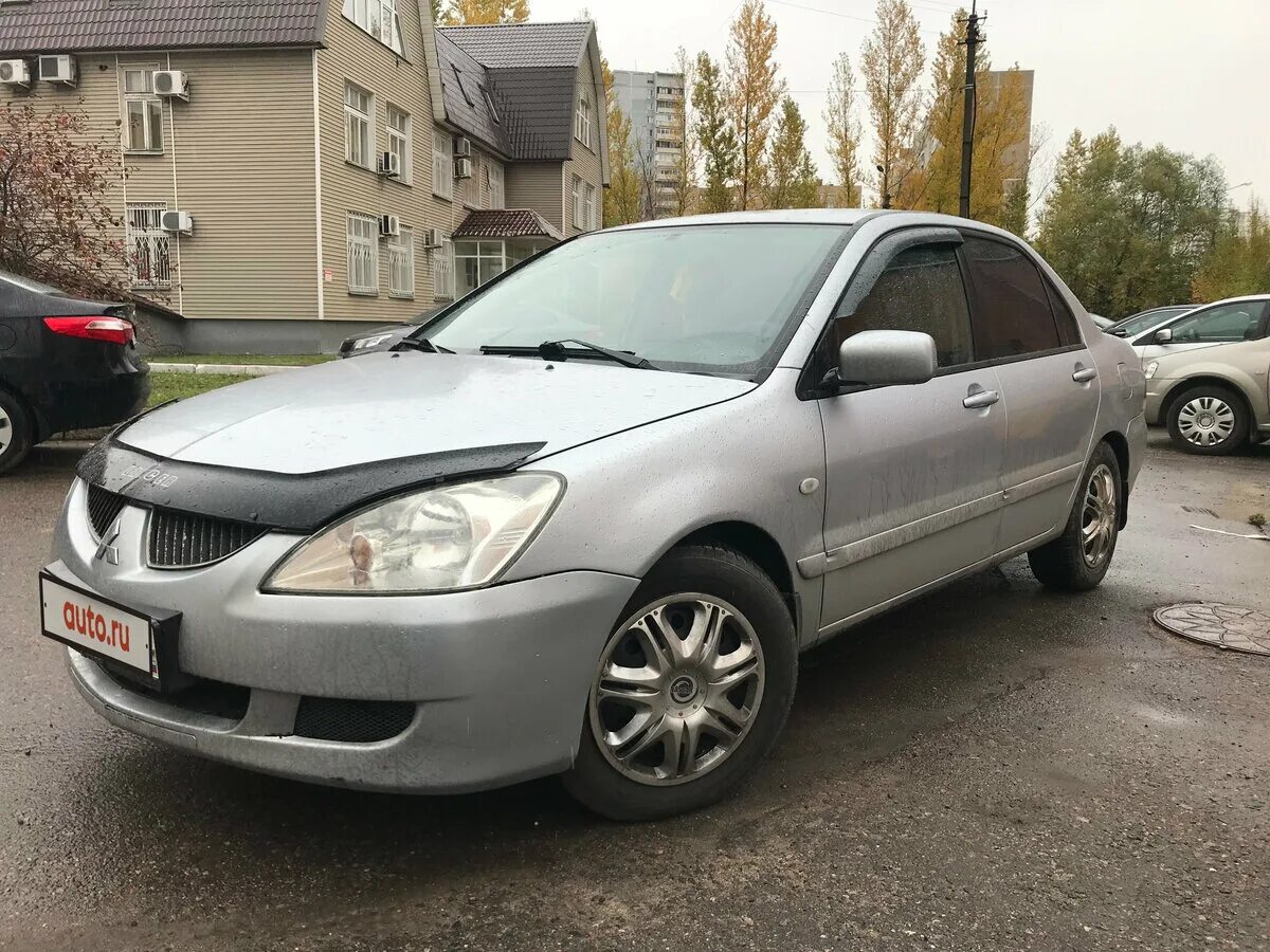 Mitsubishi lancer 2005 года. Мицубиси седан 2005. Минсубиши Лансер 2005. Митсубиси Лансер 2005 металлик в Таджикистане. Мицубиси Лансер 2005 год гос номер.