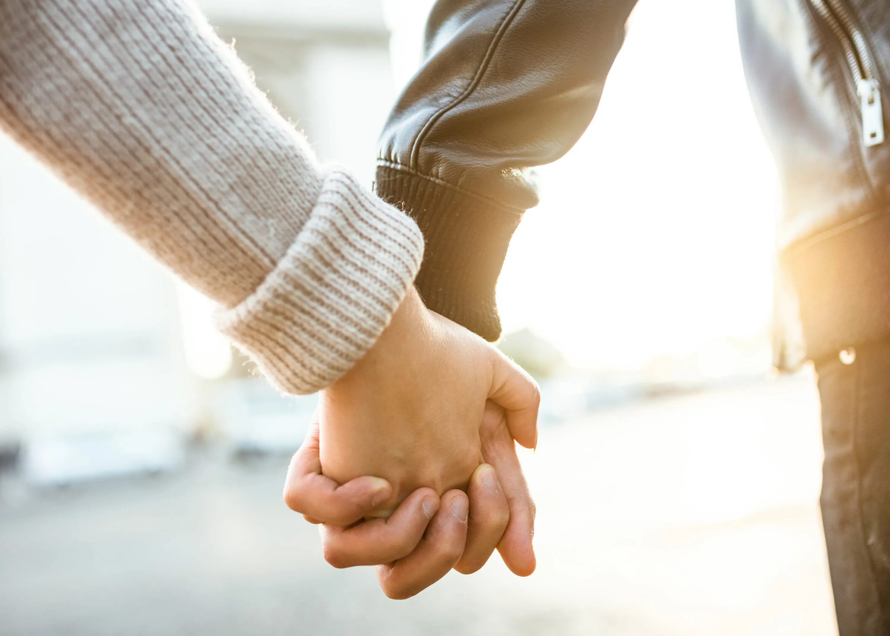 Hand in hand with one another