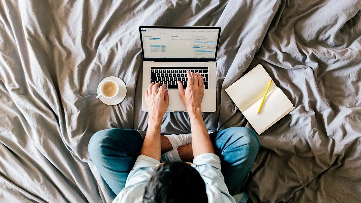 Stay at home covid. Мужчина за макбуком. Work from home. Home job. Человек за ноутбуком.