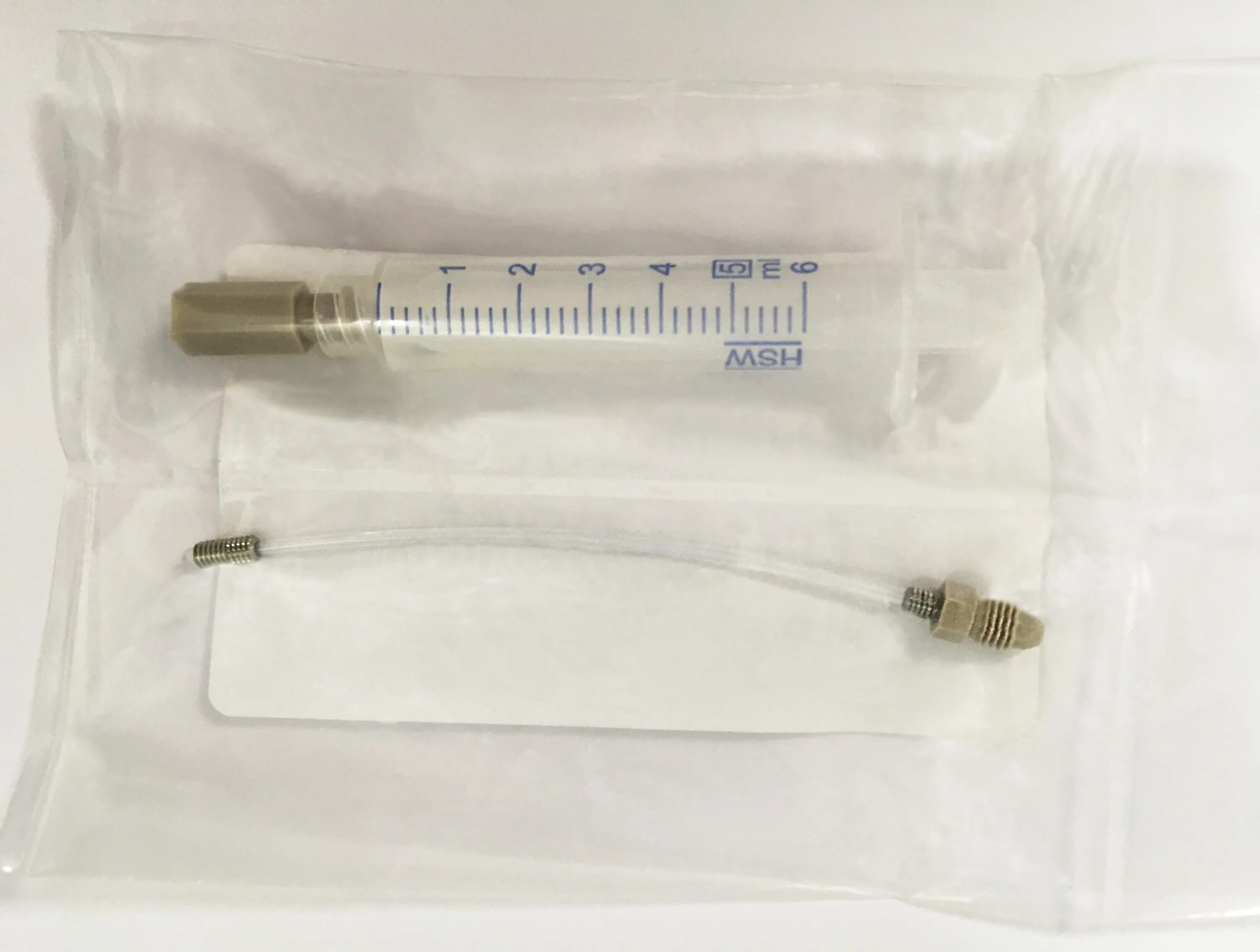 Вскрытый шприц. Шприц промывочный жане показать. agilent lc capillary in plastic sleeve. промывочное перо. купить шприцы промывочные.