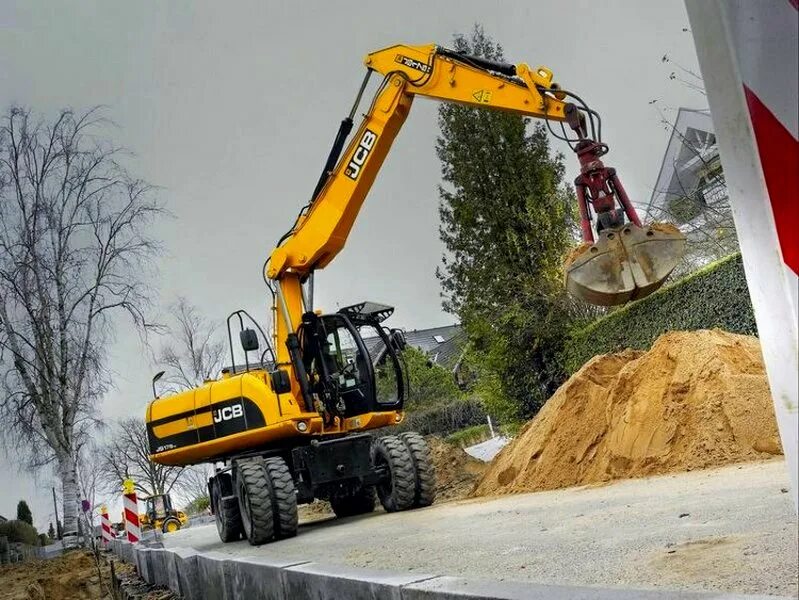 Грейфер JCB js 200 w. Экскаватор JCB 200 С грейфером. JCB 200 гусеничный грейфер. Гусеничный экскаватор с грейфером 9 метров JCB. Аренда колесного полноповоротного экскаватора