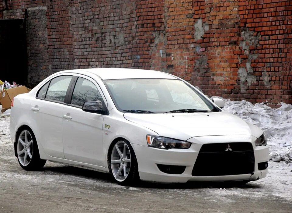 Первая мицубиси. Mitsubishi Lancer 2009. Митсубиси Лансер 10. Mitsubishi Lancer 1.8. Mitsubishi Lancer 1.8 2008.