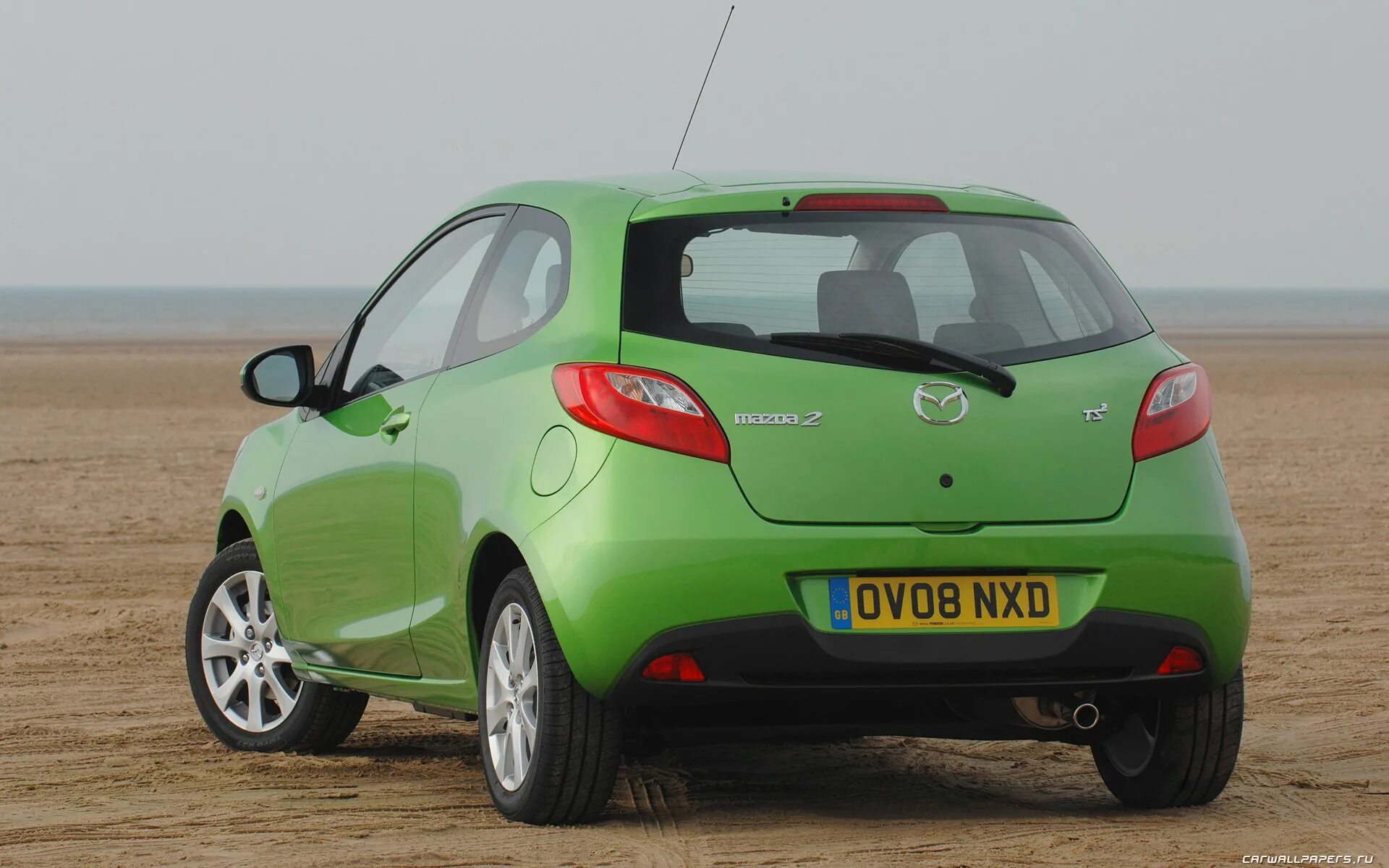 Автомобили хэтчбек с пробегом. Малолитражка Мазда 2. Mazda 2 хэтчбек. Мазда 2 Купер. Mazda 2 2008.