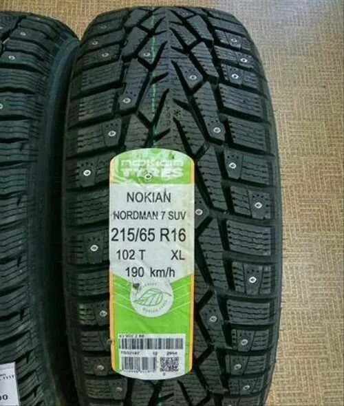 Nordman 7 suv купить. Nokian Tyres Nordman 7 SUV 215/65 r16. 215/65r16 102t XL Nokian Nordman 7 SUV (шип.). Nordman 7 215/65 r16 102t. Nokian Nordman 7 шип.