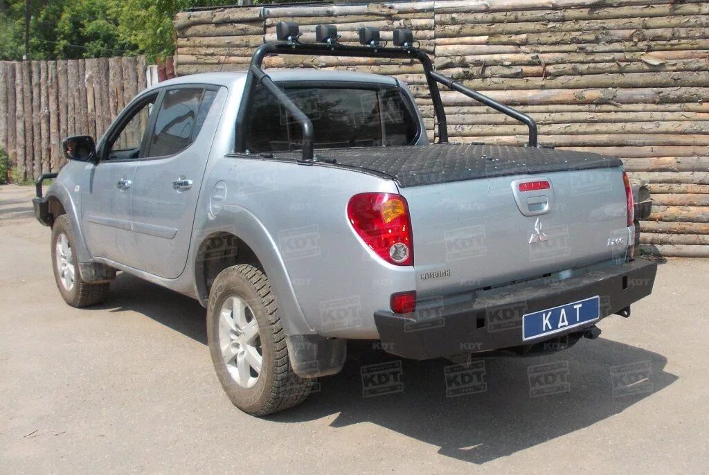 Бампера mitsubishi l200. Задний силовой бампер KDT для Mitsubishi l200. Задний силовой на Мицубиси л200. КДТ l200 бампер. L200 Triton дуги.