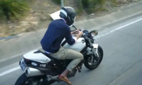 Is riding his bike