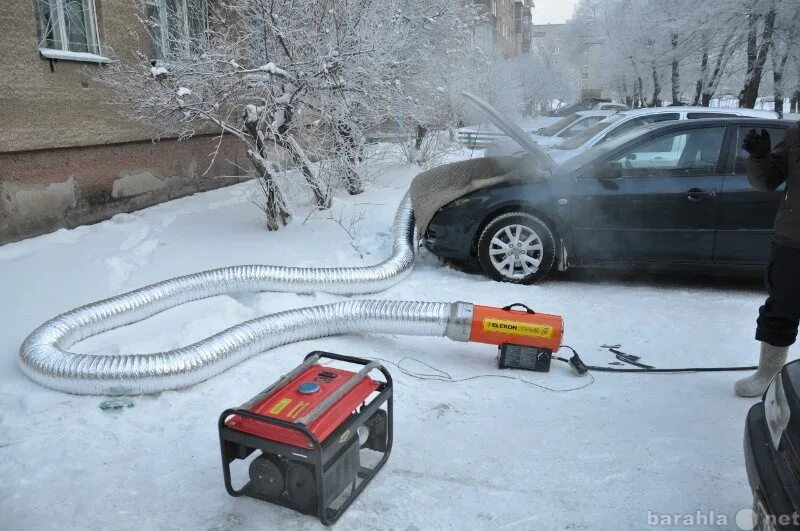 чехол для отогревания авто с тепловой пушкой. отогрев двс паяльной лампой. прогрев машины пушкой. разогрев машины. отогреть машину.