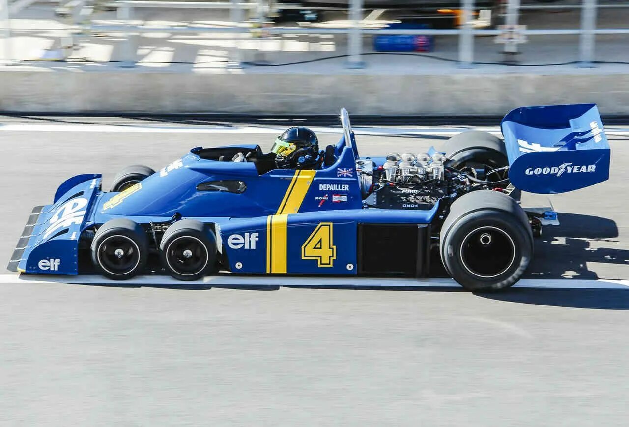 Tyrrell p34. Марч ф1 1976 на 6 колёсах. 6 колесная формула 1. Шестиколёсный болид ф1. Tyrrell p34.