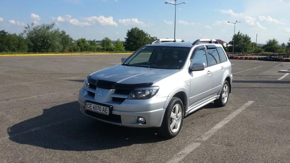 Мицубиси аутлендер московская область. Митсубиси Аутлендер 2002. Mitsubishi Outlander 2002 год. Мицубиси Аутлендер 2002г. Аутлендер Митсубиси 2005 серебристый.