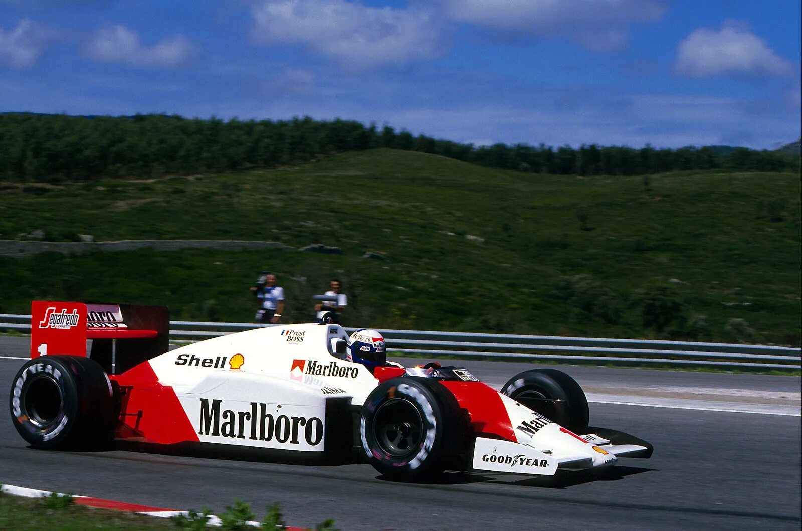 Прост формула 1. MCLAREN mp4/2. F1 MCLAREN 1985. Макларен 1986. MCLAREN mp4/2c.