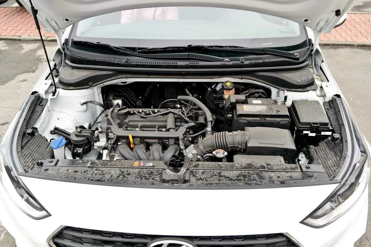 Мотор Hyundai Solaris 1.4. Двигатель Хендай Солярис 2 1.4. Хендай Солярис 2012 отсек двигателя. Двигатель Hyundai Solaris 2018 1.4.